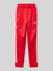 Trainingshose mit Label-Stitching Modell 'BETSCA' von adidas Originals Rot - 33