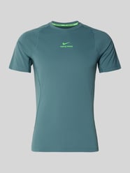 T-Shirt mit Logo-Print und Raglanärmeln von Nike Training - 15