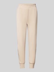 Sweatpants mit französischen Eingrifftaschen Modell 'VICTOIRE' von Guess Beige - 17