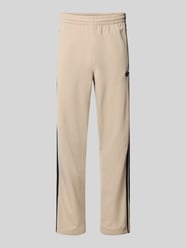 Trainingshose mit Logo Modell 'FIREBIRD' von adidas Originals Beige - 30