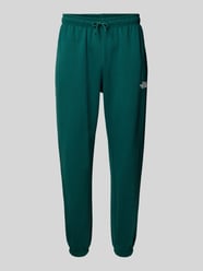 Regular Tapered Fit Sweatpants mit Label-Print von The North Face - 9