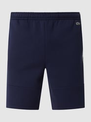 Regular Fit Sweatshorts mit Logo-Streifen von Lacoste - 24