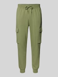 Sweatpants mit aufgesetzten Taschen Modell 'FELCZY' von ADIDAS SPORTSWEAR Grün - 32