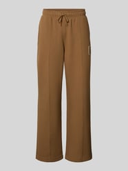Spodnie dresowe w kroju loose fit z mieszanka bawełny model 'Tenn' od Lacoste - 35