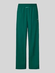 Spodnie typu track pants z naszywką z logo i nadrukiem z logo od Karo Kauer - 40