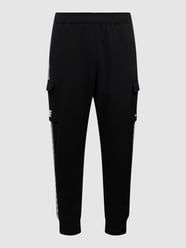 Sweatpants mit Cargotaschen Modell 'REPEAT FLC CARGO' von Nike Schwarz - 37