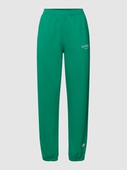 Spodnie dresowe z nadrukiem z logo model ‘CODE’ od Superdry Sports Zielony - 12