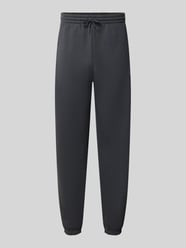 Regular Fit Sweatpants aus Baumwoll-Mix mit Label-Stitching von New Balance - 42