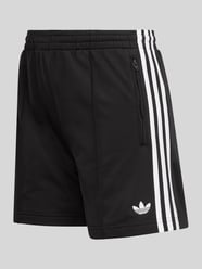 Spodnie treningowe z elastycznym pasem i wyhaftowanym logo od adidas Originals - 7