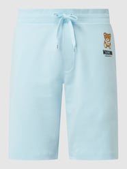 Szorty z dzianiny dresowej z wpuszczanymi kieszeniami  od Moschino Swim + Underwear Niebieski - 46