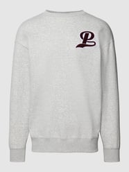 Relaxed fit sweatshirt met flockprint van PUMA PERFORMANCE Grijs - 38