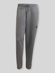 Regular Fit Sweathose mit Baumwoll-Anteil von adidas Sportswear - 21