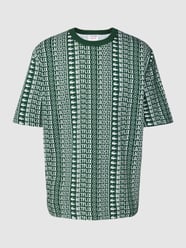 LACOSTE x Netflix - T-shirt met all-over print van Lacoste Groen - 23