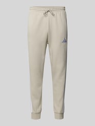 Sweatbroek met elastische band van adidas Sportswear Beige - 23