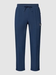 Spodnie dresowe z fakturowanym wzorem od EA7 Emporio Armani Niebieski - 44