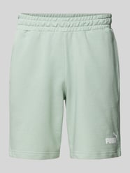 Regular Fit Sweatshorts mit Label-Print von PUMA PERFORMANCE Grün - 23