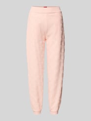 Slim fit sweatpants van katoenmix, model 'TERRYMONOGRAM' van HUGO Fuchsia - 15