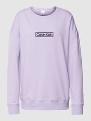 Spodnie dresowe z detalami z logo od Calvin Klein Underwear Fioletowy - 22