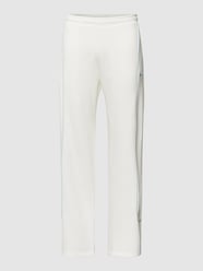 Spodnie dresowe z paskami w kontrastowym kolorze od REVIEW - 27