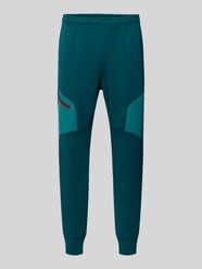 Regular Fit Sweatpants mit Logo-Print Modell 'Unstoppable' von Under Armour - 43