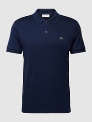 Koszulka polo o kroju regular fit w jednolitym kolorze od Lacoste - 30