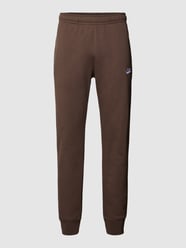 Spodnie dresowe z wyhaftowanym logo od Nike Brązowy - 10
