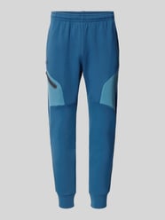 Regular Fit Sweatpants mit Logo-Print Modell 'Unstoppable' von Under Armour - 16