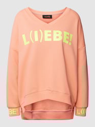 Bluza z dekoltem w serek model ‘L(I)EBE!’ od miss goodlife Pomarańczowy - 6