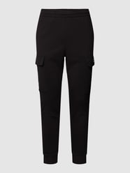 Spodnie dresowe z nadrukiem z logo od EA7 Emporio Armani Czarny - 15