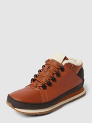 Sneakers met contrastgarnering van New Balance Bruin - 25