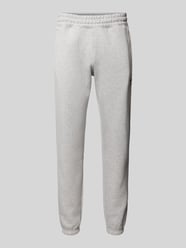 Tapered Fit Sweatpants mit Label-Stitching von adidas Originals Grau - 23