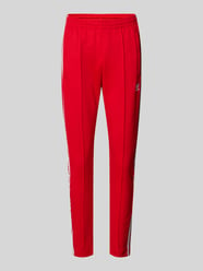 Slim fit sweatbroek met vaste persplooien van adidas Originals Rood - 8