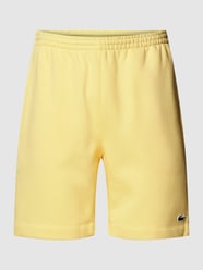 Sweatshorts mit Label-Patch Modell 'Basic' von Lacoste Gelb - 20