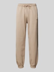 Relaxed Fit Sweatpants mit Label-Print Modell 'EMIS' von Guess Activewear Beige - 4