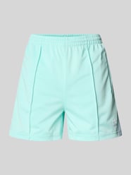 Relaxed Fit Shorts mit Reißverschlusstaschen Modell 'FIREBIRD' von adidas Originals - 42