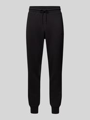 Tapered Fit Sweatpants mit Label-Print von PUMA PERFORMANCE Schwarz - 44