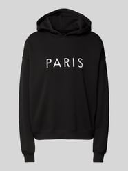 Oversized Hoodie mit Statement-Print von Gina Tricot Schwarz - 1