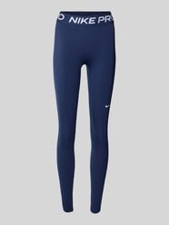 Slim Fit Leggins mit Logo-Print von Nike Training - 35
