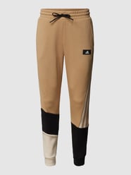 Sweathose im Colour-Blocking-Design von ADIDAS SPORTSWEAR Beige - 40