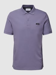 Koszulka polo z naszywką z logo od CK Calvin Klein Fioletowy - 32