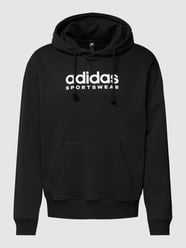 Hoodie mit Label-Print von ADIDAS SPORTSWEAR Schwarz - 44