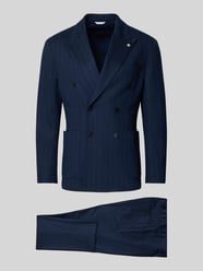 Garnitur o kroju slim fit z dwurzędową marynarką i spodniami z kantami od Manuel Ritz - 36