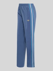 Spodnie treningowe z wyhaftowanym logo od adidas Originals - 44
