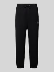 Regular fit sweatpants met logostitching, model 'Signature' van KARL KANI - 8