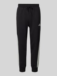 Relaxed Fit Sweatpants mit Logo-Print von ADIDAS SPORTSWEAR Schwarz - 47