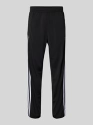 Trainingsbroek met ritszakken, model 'FIREBIRD' van adidas Originals - 1