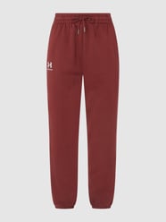 Spodnie z dzianiny dresowej z wpuszczanymi kieszeniami od Under Armour Bordowy - 16