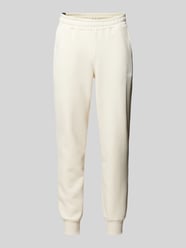 Relaxed Fit Sweatpants mit Label-Print von PUMA PERFORMANCE Beige - 7