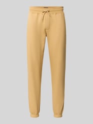 Slim fit joggingbroek van katoenmix van Tommy Jeans Beige - 46