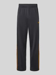 Relaxed Fit Sweatpants mit Label-Streifen Modell 'FIREBIRD' von adidas Originals - 14